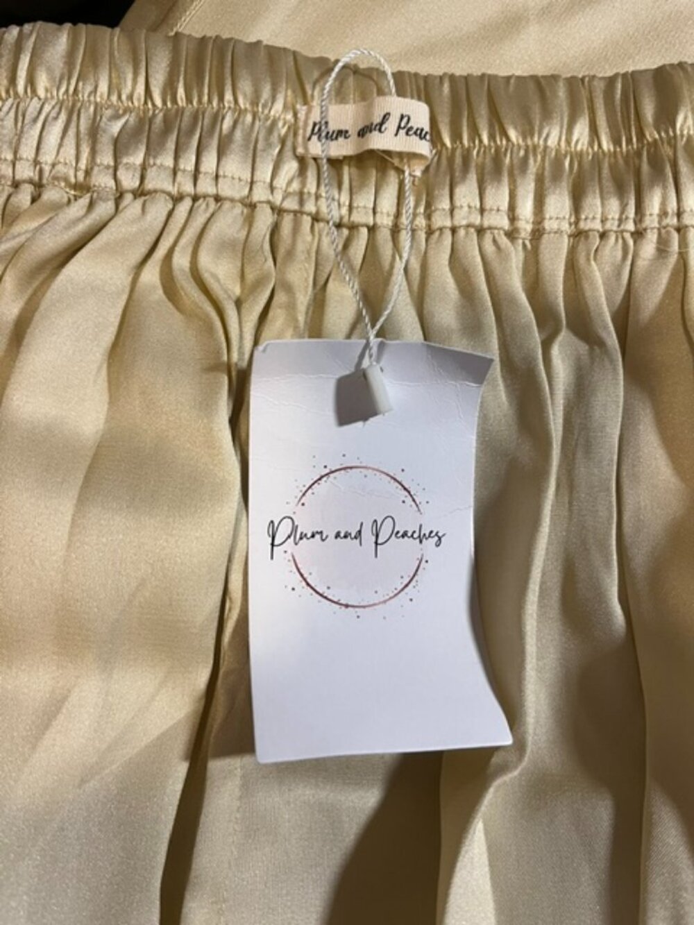 New with tags! Champagne silk flying skirt